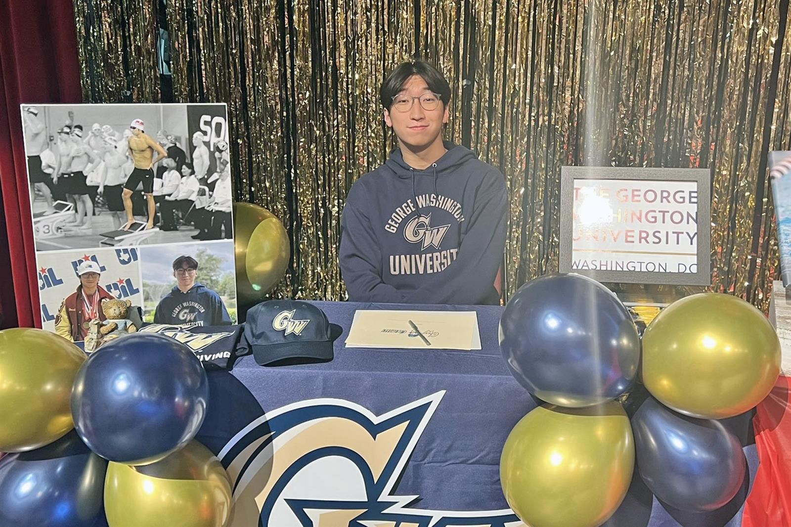 Cypress Woods High School senior Daniel Choi signed a letter of intent to The George Washington University.